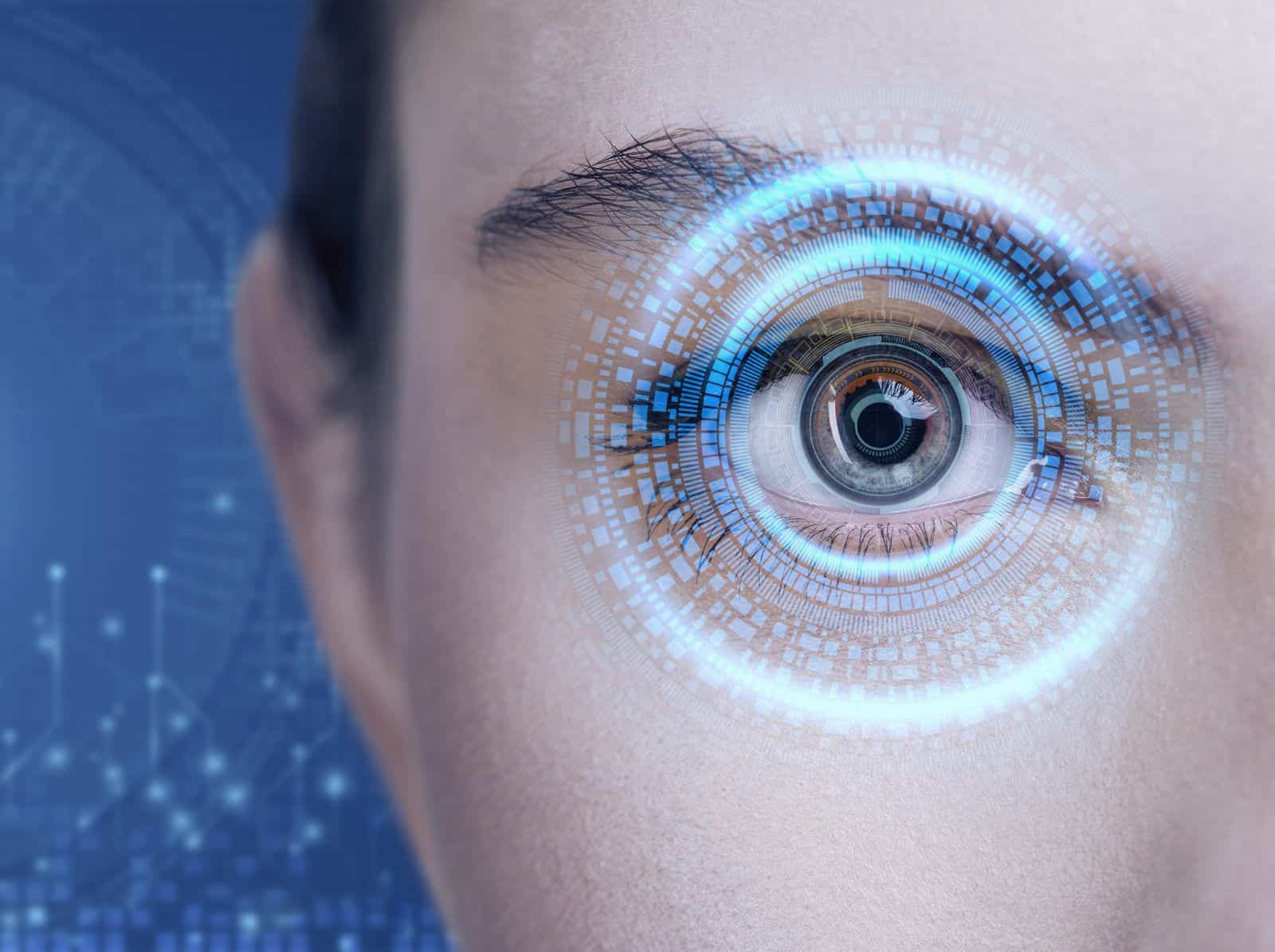 Close-up of eye scanning with digital interface overlay, representing futuristic biometric technology