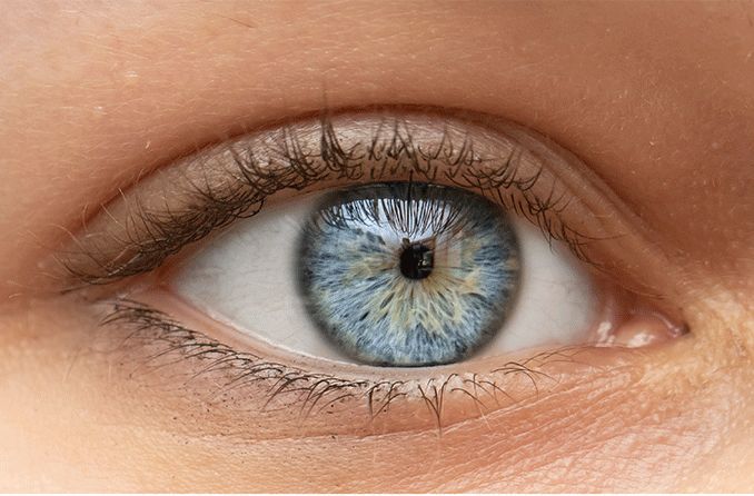a close-up image of a woman's eyes with miosis